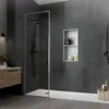 A modern bathroom with a walk-in shower and vanity. Náhľad obrázku produktu