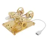 A golden colored Stirling engine model with two cylinders and a USB cable attached, shown on a white background. Produktbild-Vorschau