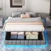 A bed with storage underneath, showing folded linens and blankets inside. Náhľad obrázku produktu