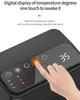 A close-up of a person's finger touching a digital display on a black electronic device, likely a heater, showing temperature and timer settings. Produktbild-Vorschau