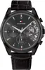 A black Tommy Hilfiger men's watch with a leather strap is shown against a white background. Produktbild-Vorschau