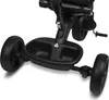 A close-up view of the base and wheels of a black tricycle. Produktbild-Vorschau