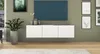 A modern living room with a wall-mounted TV and a white lowboard. Produktbild-Vorschau