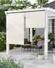 An outdoor patio with a pergola covered by beige roller shades, furnished with wicker chairs and a coffee table. Produktbild-Vorschau