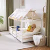A child's bed with a canopy, decorated with stuffed animals and a basket. Anteprima dell’immagine prodotto