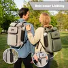 A couple walking outdoors with backpacks. Produktbild-Vorschau