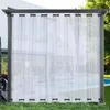 A white outdoor curtain hangs in front of a modern house and pool area. Produktbild-Vorschau