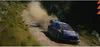 A rally car speeding on a dirt track, kicking up dust. Podgląd zdjęcia produktu