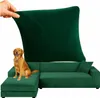 A green sectional sofa with a dog sitting on it, and a hand holding up a green sofa cover. Podgląd zdjęcia produktu