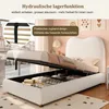 A bed with its storage compartment open, showcasing stored items and highlighting its hydraulic lift mechanism. Anteprima dell’immagine prodotto