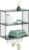 A black metal wall shelf with two shelves and hooks underneath, displaying bathroom accessories. Produktbild-Vorschau