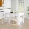 A dining table with chairs in a bright, modern room. Produktbild-Vorschau