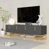 A modern living room with a TV stand, TV, lamp, plant, and decorative items. Produktbild-Vorschau