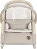 A close-up front view of a baby bouncer. Voir les images du produit