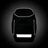 A black backpack with reflective strips against a dark gradient background. Produktbild-Vorschau