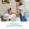 A young girl is washing her hands in a modern bathroom sink. Anteprima dell’immagine prodotto
