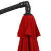 A close-up view of the top mechanism and folded fabric of a red umbrella. Anteprima dell’immagine prodotto