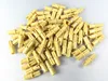 A pile of beige LEGO Technic pins with axles. Produktbild-Vorschau