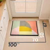 A doormat placed on a tiled floor in front of a door, with dimensions indicated. Produktbild-Vorschau