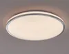 A modern LED ceiling light with a chrome trim, illuminated against a neutral background. Produktbild-Vorschau