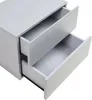 A close-up, angled view of a light gray bedside table with two open drawers. Produktbild-Vorschau