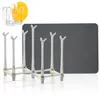 A product image featuring a drying rack for cups and dishes, with a darker gray mat behind it. Produktbild-Vorschau