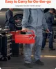 Three mechanics in a workshop, one holding a red toolbox. Podgląd zdjęcia produktu