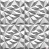 A white, geometric, 3D wall panel pattern. Náhled obrázku produktu