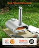A stainless steel pizza oven with a pizza inside, set up outdoors on a table. Produktbild-Vorschau