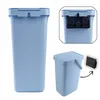 A collage of images showing a light blue plastic trash can with a lid and handle, and a close-up of its mounting bracket. Produktbild-Vorschau