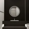 A modern bathroom vanity with a round LED mirror above a sink. Produktbild-Vorschau
