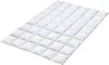 A white quilted duvet is laid out on a white background. Produktbild-Vorschau
