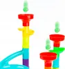 A colorful plastic ball run toy for children, with green balls falling into funnels. Produktbild-Vorschau