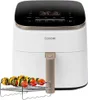 A white COSORI air fryer with a digital display and a rack of skewers in front of it. Náhľad obrázku produktu