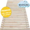 A wooden slatted bed base is shown diagonally from a slightly elevated side view against a white background. A yellow circular sticker with product details and a light blue cloud shape with text "WOLKENLAND" are overlaid on the image. Produktbild-Vorschau