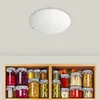 A ceiling light fixture is shown above a shelf filled with jars of preserved food. Produktbild-Vorschau