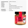A jar of Eierlikör with a festive Christmas-themed label. Produktbild-Vorschau