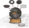 An illustration showing the assembly of a fire pit and its accessories, with arrows indicating how each part fits together. Produktbild-Vorschau
