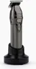 A black and gray BaByliss Pro beard trimmer is shown standing upright on its charging base against a white background. Anteprima dell’immagine prodotto
