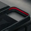 A close-up view of the interior of a black phone case with a red accent. Anteprima dell’immagine prodotto