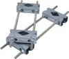 Four metal clamps with threaded rods connecting them, arranged in a diamond shape. Voir les images du produit