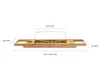 A wooden bath tray with dimensions indicated by measurement lines and text. Produktbild-Vorschau