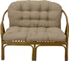 A studio shot of a two-seater rattan bench with beige cushions. Anteprima dell’immagine prodotto