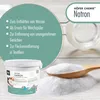A bucket of Natron (baking soda) and a wooden spoon filled with the product, set against a light wooden background with a circular graphic overlay listing product uses. Produktbild-Vorschau