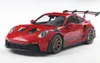A red Porsche 911 GT3 RS model car is displayed on a white background. Produktbild-Vorschau