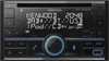 A close-up front view of a Kenwood car stereo with its display screen showing various information. Anteprima dell’immagine prodotto