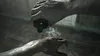 A close-up of hands pouring liquid from a bottle onto another hand. Produktbild-Vorschau