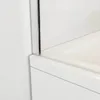 A close-up view of a shower screen edge and bathtub edge. Produktbild-Vorschau