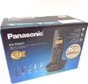 The image shows the retail packaging of a Panasonic cordless phone. Podgląd zdjęcia produktu