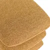 A close-up view of stacked fabric cushions. Podgląd zdjęcia produktu